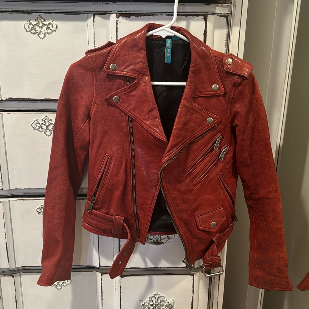 Truth and Pride red leather jacket.